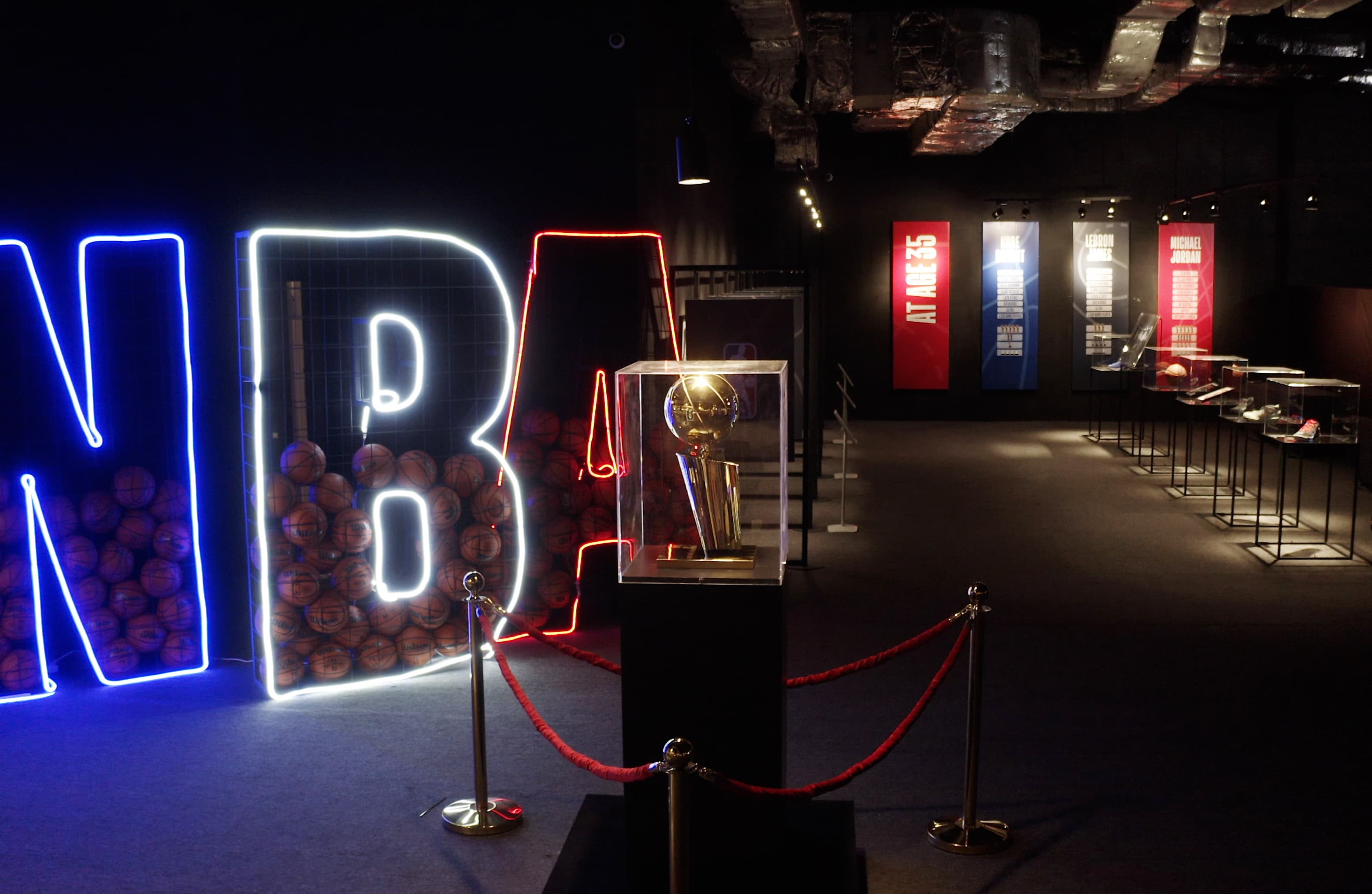 Neon NBA sign in a dark room